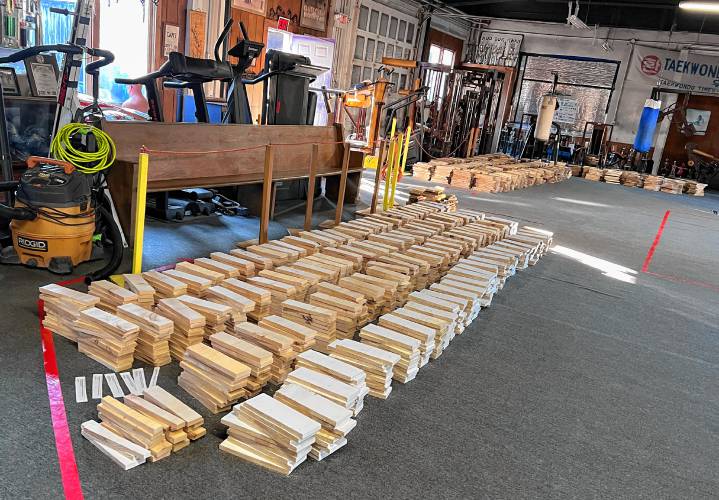 Ahead of the Greenfield Tae Kwon Do Center’s annual “break-athon” fundraiser, volunteers gathered on Nov. 12 to cut the contributed lumber into boards. The “break-athon” will be held Sunday, Nov. 19, at 1 p.m. at the center, located at 102 Federal St. in Greenfield.