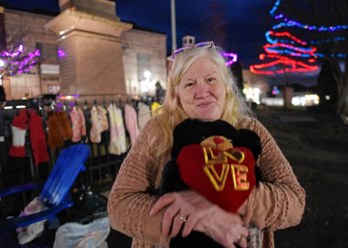 Wendell resident Sandra Beebe draped the Greenfield Common with hats, scarves, gloves, blankets and other garments for anyone in need to take on Monday.
