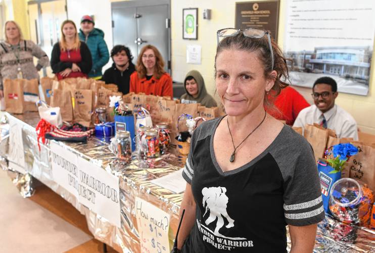 Greenfield High School Essential Skills teacher Cherilyn Bulger and her students are having a raffle in the cafeteria during lunch to raise money for the Wounded Warrior Project.