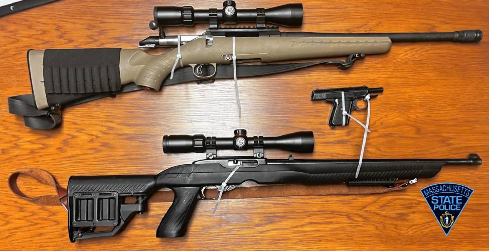 Guns confiscated by Massachusetts State Police and Environmental Police after arresting two alleged poachers in Colrain on Saturday, Dec. 2.