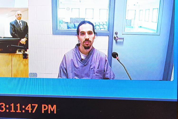 Joshua Hart, convicted in 2018 of killing Orange residents Thomas Harty and Joanna Fisher, appears in Franklin County Superior Court via Zoom from the Souza-Baranowski Correctional Facility on Tuesday afternoon.