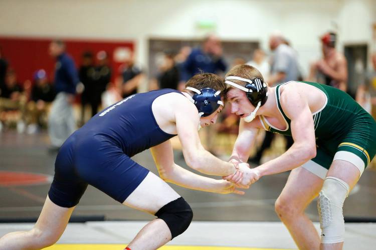 Franklin Tech’s Jacob Martin competes against Taconic’s Justin Borawski in the 157-pound quarterfinal Saturday during the MIAA Division 3 Western Mass wrestling championships at Mount Greylock Regional School in Williamstown.