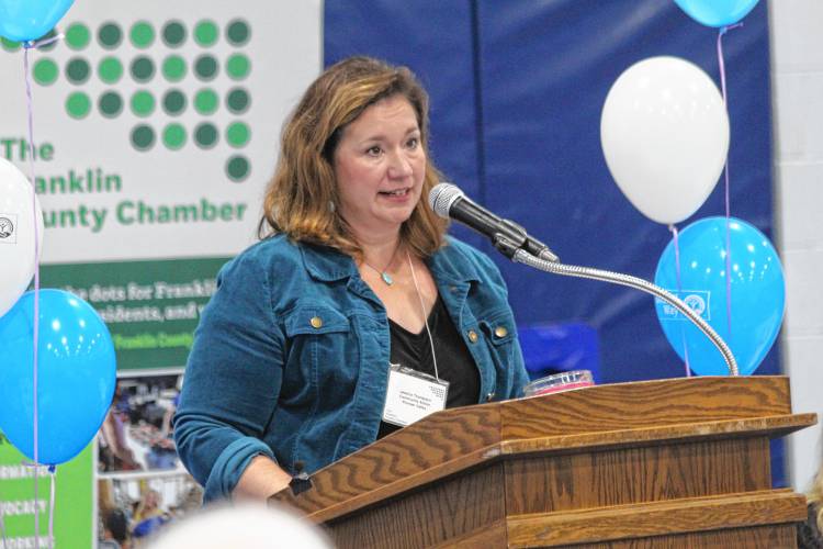 Community Action Pioneer Valley Associate Director for Community Engagement Jessica Thompson speaks at the United Way of the Franklin & Hampshire Region’s fundraising campaign celebration at Franklin County Technical School on Friday morning.