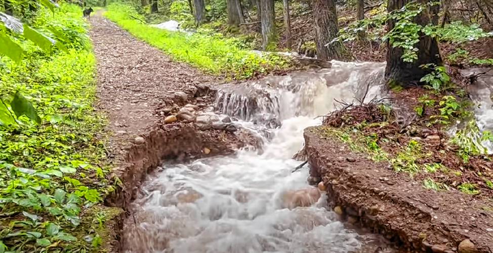 An image from a video recorded by Eva Gibavic in July shows the damage to Rattlesnake Gutter Road in Leverett caused by the summer’s wet weather. The town must decide whether to keep maintaining the closed portion of the road that provides access to popular recreation areas.