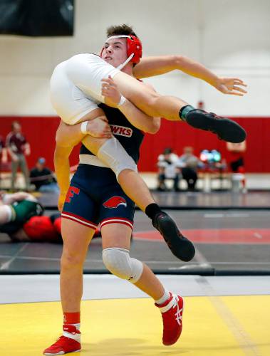 Frontier’s Edward Mieczkowski competes to a third place finish against Hampden Charter’s Alan Misenheimer in the 175-pound bout Saturday during the MIAA Division 3 Western Mass wrestling championships at Mount Greylock Regional School in Williamstown. 