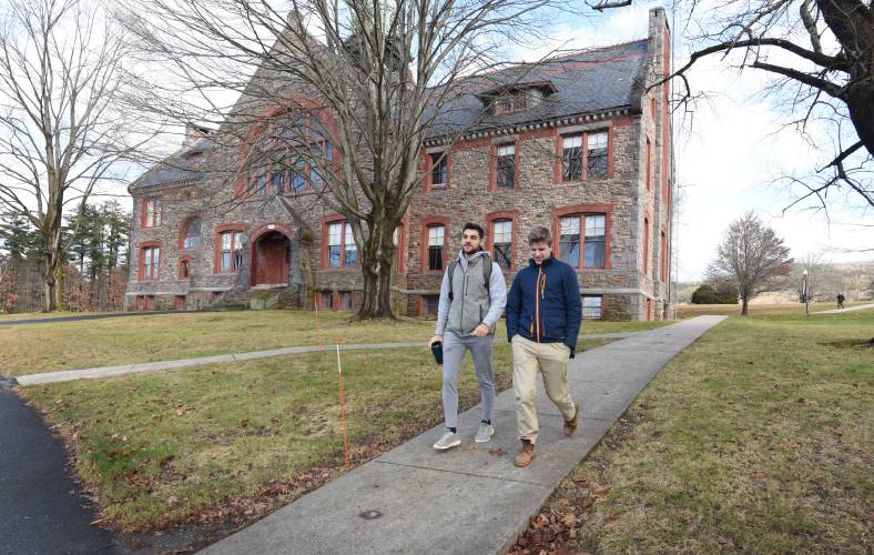 Students walk across the Thomas Aquinas College campus in Northfield in December. Thanks to Maureen Rawlinson and Cheryl Robinson, trustees of the Fritz B. Burns Foundation, Thomas Aquinas College President Paul O’Reilly was presented with a $3 million check to support student financial aid at the college’s two campuses in Northfield and Santa Paula, Calif.