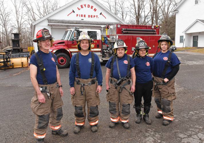Five of the seven members of the Leyden Fire Department, pictured at the station in December 2023. From left are Capt. Tom Raffensperger, Assistant Chief Carey Barton, Chief Nikolas Adamski, Tina Riddell and Corrinda Thompson. Not pictured are Timothy Howard and Ernest Royer. While Adamski plans to resign as chief, he will continue to serve on the department.